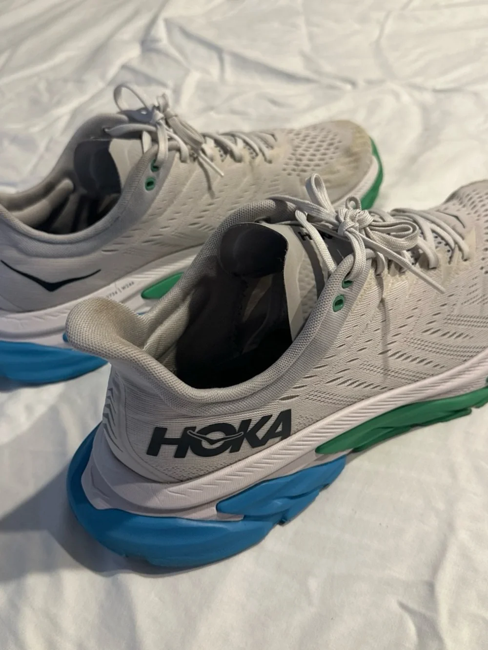 Hoka Men's White Running Shoes with Green and Blue Soles